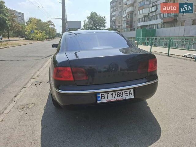 Черный Фольксваген Фаетон, объемом двигателя 3.19 л и пробегом 249 тыс. км за 5500 $, фото 5 на Automoto.ua