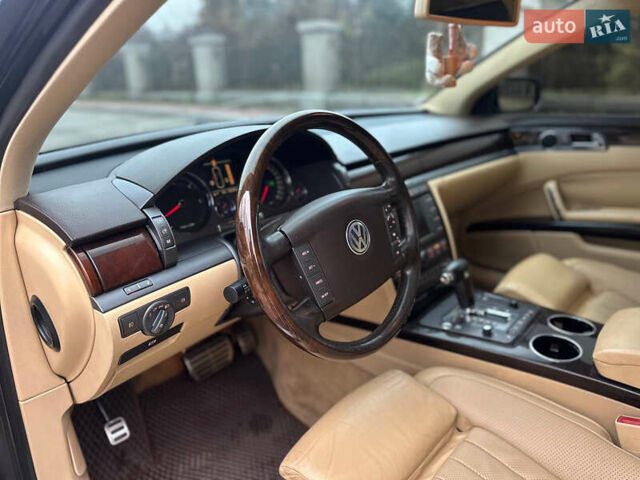 Чорний Фольксваген Фаєтон, об'ємом двигуна 5 л та пробігом 272 тис. км за 6700 $, фото 22 на Automoto.ua