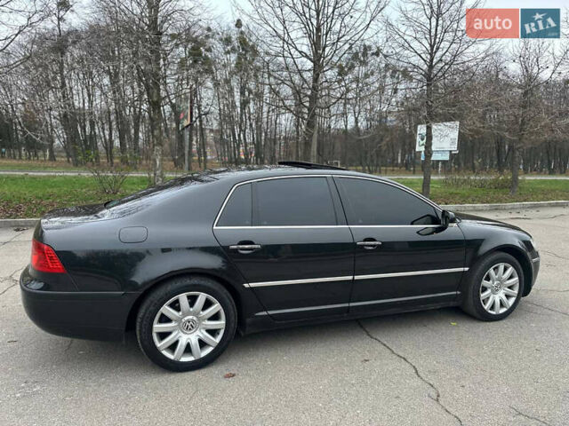Чорний Фольксваген Фаєтон, об'ємом двигуна 5 л та пробігом 272 тис. км за 6700 $, фото 49 на Automoto.ua