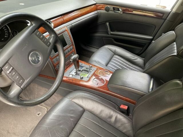 Черный Фольксваген Фаетон, объемом двигателя 3 л и пробегом 230 тыс. км за 5400 $, фото 4 на Automoto.ua