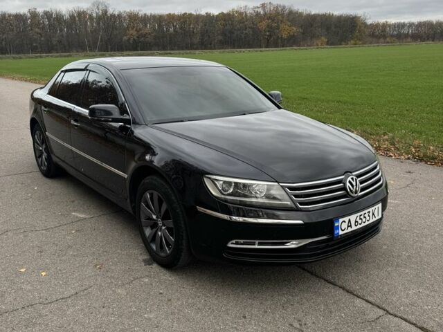 Черный Фольксваген Фаетон, объемом двигателя 3 л и пробегом 300 тыс. км за 13000 $, фото 2 на Automoto.ua