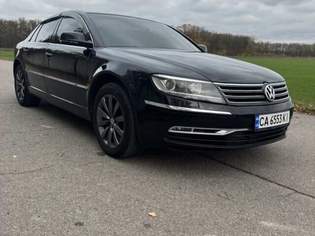 Черный Фольксваген Фаетон, объемом двигателя 3 л и пробегом 300 тыс. км за 13000 $, фото 1 на Automoto.ua