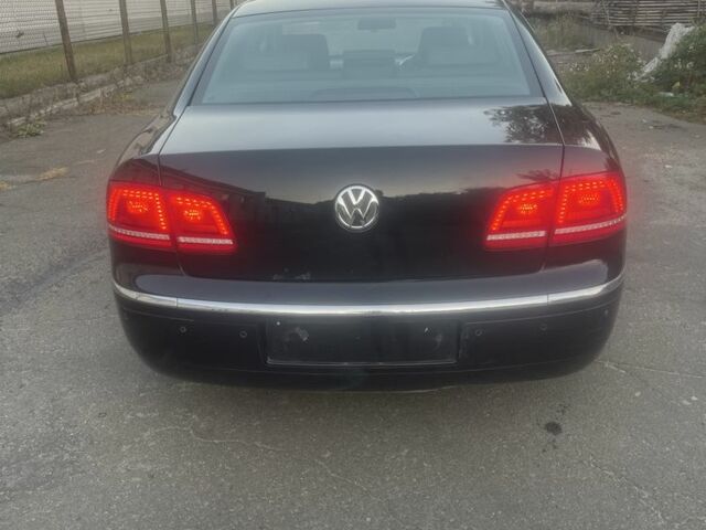 Черный Фольксваген Фаетон, объемом двигателя 3 л и пробегом 235 тыс. км за 5500 $, фото 1 на Automoto.ua