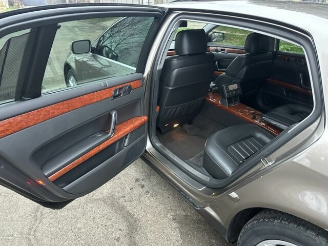 Коричневый Фольксваген Фаетон, объемом двигателя 4.2 л и пробегом 234 тыс. км за 5200 $, фото 13 на Automoto.ua