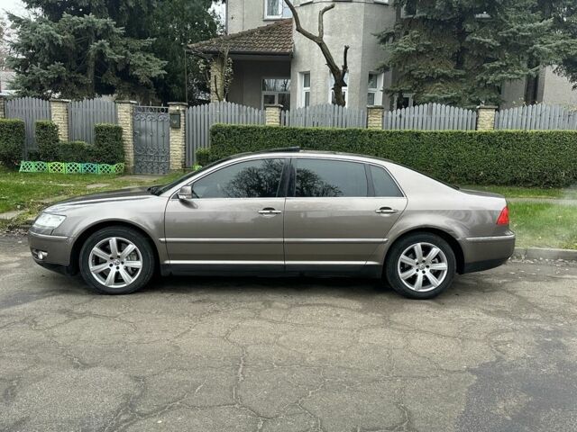 Коричневый Фольксваген Фаетон, объемом двигателя 4.2 л и пробегом 234 тыс. км за 5200 $, фото 6 на Automoto.ua