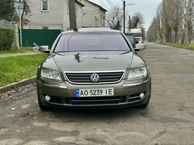 Коричневый Фольксваген Фаетон, объемом двигателя 4.2 л и пробегом 234 тыс. км за 5200 $, фото 2 на Automoto.ua