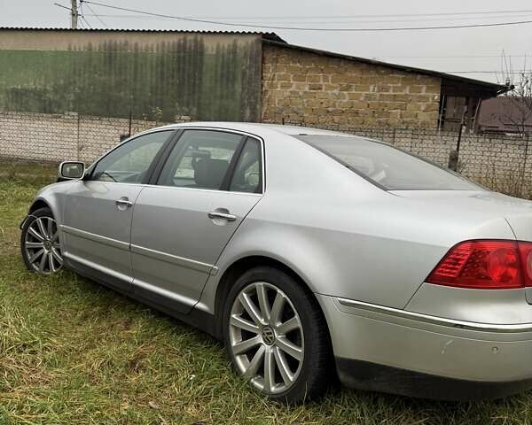 Серый Фольксваген Фаетон, объемом двигателя 3 л и пробегом 258 тыс. км за 5000 $, фото 1 на Automoto.ua