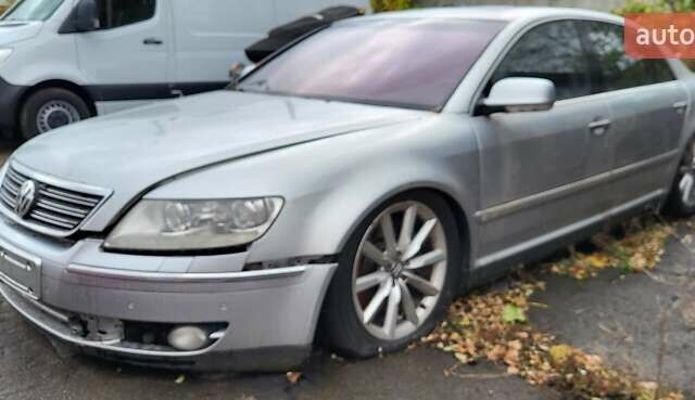 Серый Фольксваген Фаетон, объемом двигателя 4.2 л и пробегом 287 тыс. км за 5999 $, фото 1 на Automoto.ua