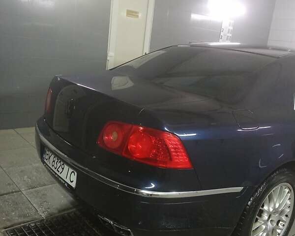 Синий Фольксваген Фаетон, объемом двигателя 3.19 л и пробегом 320 тыс. км за 4600 $, фото 8 на Automoto.ua