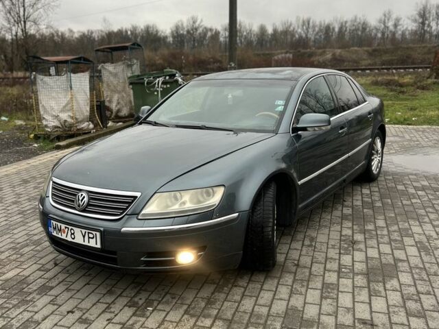 Синий Фольксваген Фаетон, объемом двигателя 3 л и пробегом 280 тыс. км за 3950 $, фото 5 на Automoto.ua