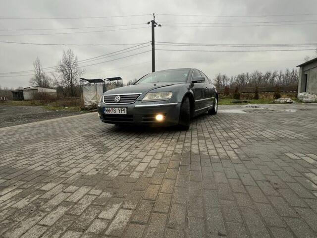 Синий Фольксваген Фаетон, объемом двигателя 3 л и пробегом 280 тыс. км за 3950 $, фото 2 на Automoto.ua