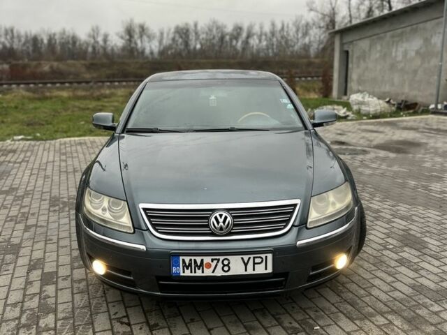 Синий Фольксваген Фаетон, объемом двигателя 3 л и пробегом 280 тыс. км за 3950 $, фото 4 на Automoto.ua