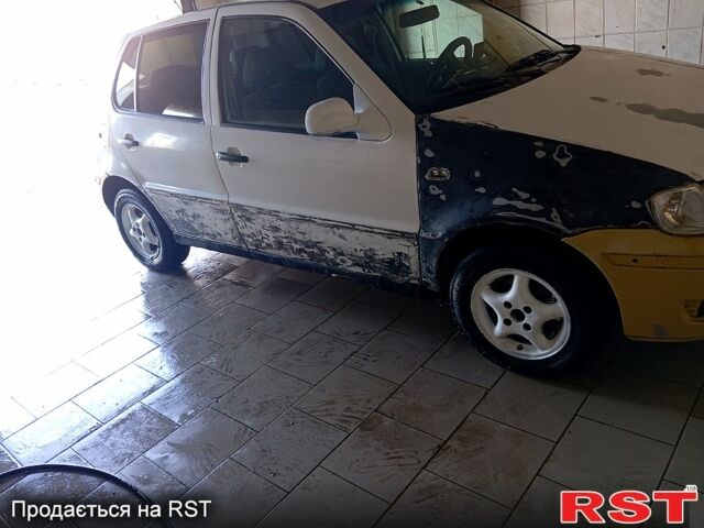 Белый Фольксваген Поло, объемом двигателя 1 л и пробегом 326 тыс. км за 1500 $, фото 3 на Automoto.ua