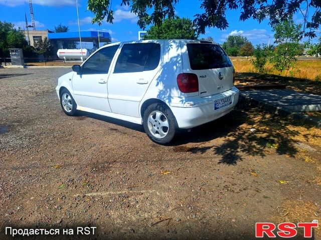 Белый Фольксваген Поло, объемом двигателя 1.4 л и пробегом 190 тыс. км за 1999 $, фото 2 на Automoto.ua