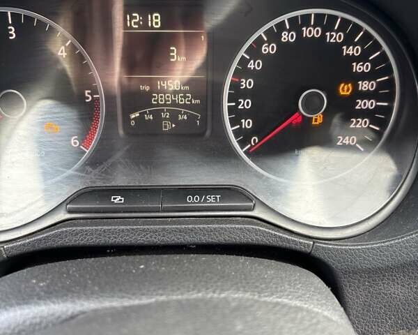 Белый Фольксваген Поло, объемом двигателя 1.2 л и пробегом 285 тыс. км за 5000 $, фото 1 на Automoto.ua