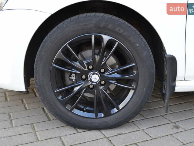 Білий Фольксваген Поло, об'ємом двигуна 1.4 л та пробігом 211 тис. км за 7500 $, фото 2 на Automoto.ua