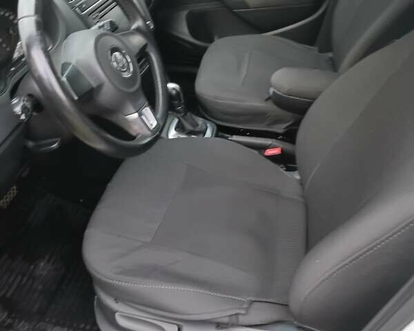 Білий Фольксваген Поло, об'ємом двигуна 1.39 л та пробігом 227 тис. км за 7000 $, фото 7 на Automoto.ua