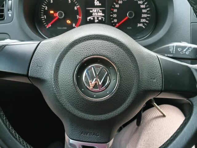 Білий Фольксваген Поло, об'ємом двигуна 1.4 л та пробігом 226 тис. км за 7000 $, фото 4 на Automoto.ua