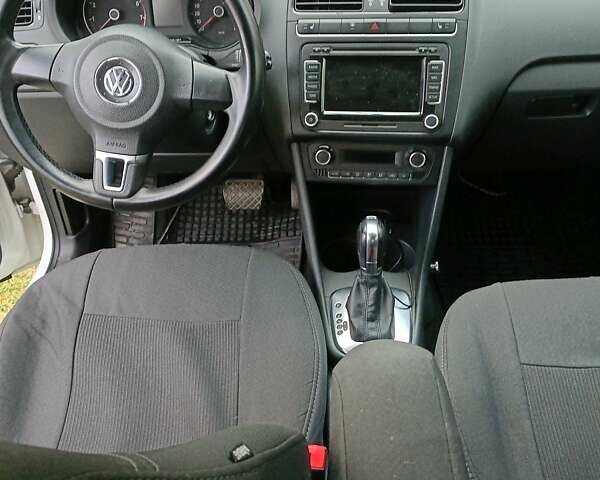 Білий Фольксваген Поло, об'ємом двигуна 1.39 л та пробігом 227 тис. км за 7000 $, фото 6 на Automoto.ua