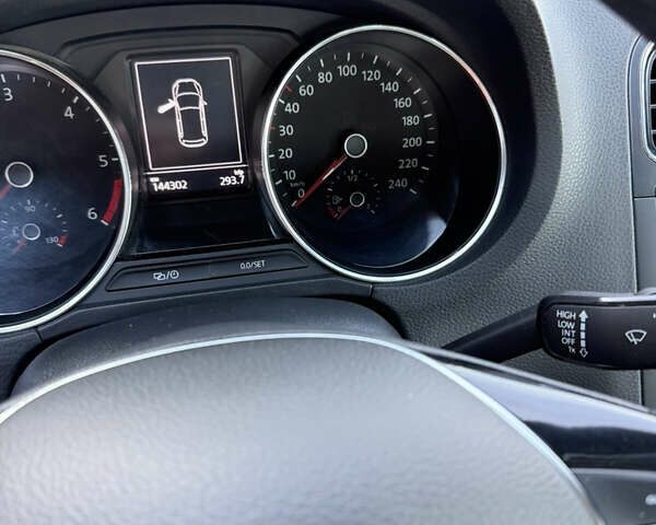 Білий Фольксваген Поло, об'ємом двигуна 1.4 л та пробігом 143 тис. км за 10700 $, фото 12 на Automoto.ua