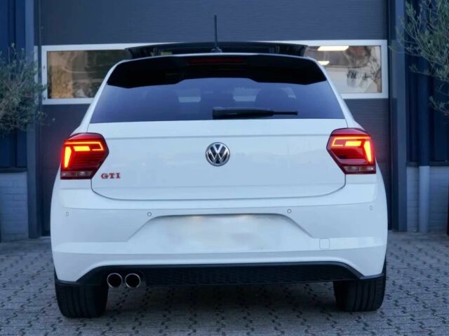 Білий Фольксваген Поло, об'ємом двигуна 2 л та пробігом 30 тис. км за 7000 $, фото 4 на Automoto.ua