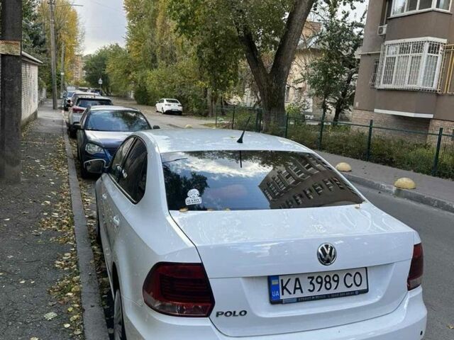 Белый Фольксваген Поло, объемом двигателя 1.4 л и пробегом 99 тыс. км за 10000 $, фото 2 на Automoto.ua