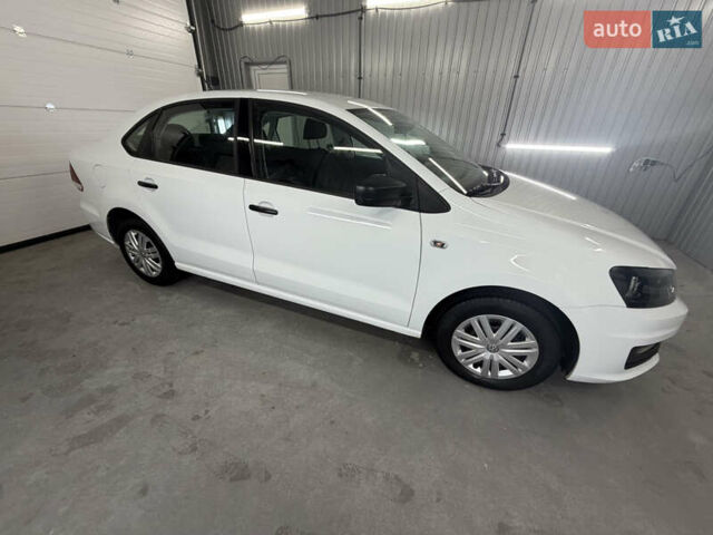 Білий Фольксваген Поло, об'ємом двигуна 1.4 л та пробігом 58 тис. км за 11000 $, фото 5 на Automoto.ua