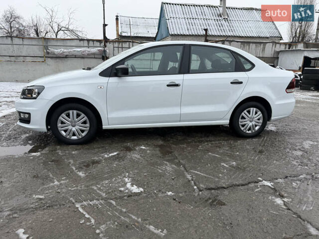 Білий Фольксваген Поло, об'ємом двигуна 1.4 л та пробігом 58 тис. км за 11000 $, фото 13 на Automoto.ua
