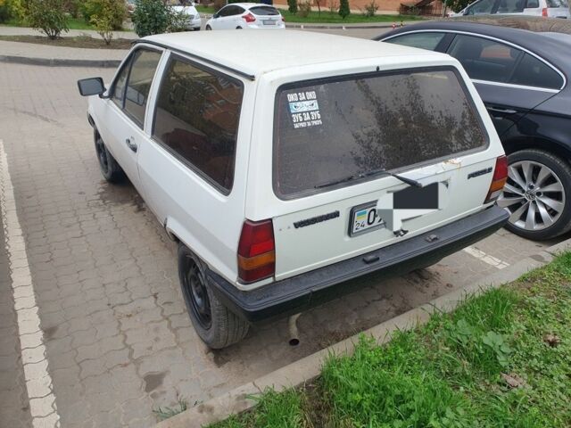 Белый Фольксваген Поло, объемом двигателя 1 л и пробегом 90 тыс. км за 950 $, фото 1 на Automoto.ua