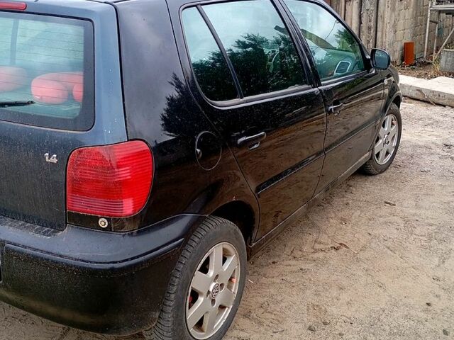 Чорний Фольксваген Поло, об'ємом двигуна 1.4 л та пробігом 320 тис. км за 2300 $, фото 1 на Automoto.ua