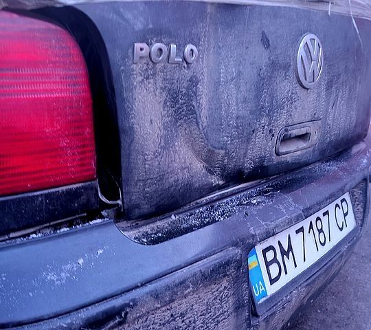 Черный Фольксваген Поло, объемом двигателя 1.4 л и пробегом 200 тыс. км за 1300 $, фото 1 на Automoto.ua