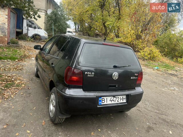 Фольксваген Поло 2001 у Дніпро (Дніпропетровську) на Automoto.ua Чорний Фольксваген Поло, об'ємом двигуна 1.4 л та пробігом 216 тис. км за 2500 $, фото 3 на Automoto.ua