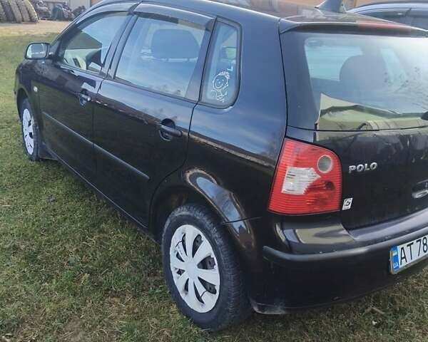 Черный Фольксваген Поло, объемом двигателя 1.4 л и пробегом 160 тыс. км за 4750 $, фото 11 на Automoto.ua