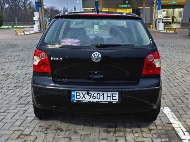 Черный Фольксваген Поло, объемом двигателя 1.2 л и пробегом 219 тыс. км за 3950 $, фото 1 на Automoto.ua