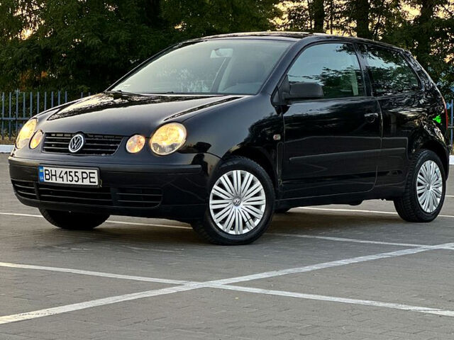 Черный Фольксваген Поло, объемом двигателя 1.2 л и пробегом 192 тыс. км за 3300 $, фото 1 на Automoto.ua