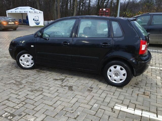 Черный Фольксваген Поло, объемом двигателя 1.2 л и пробегом 219 тыс. км за 3950 $, фото 2 на Automoto.ua