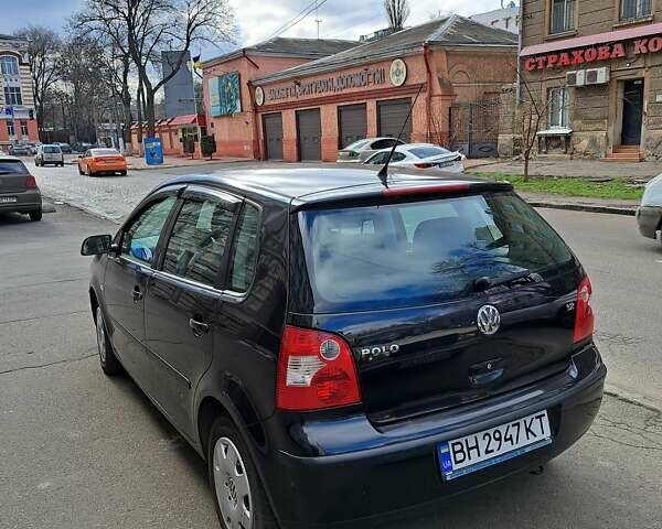 Черный Фольксваген Поло, объемом двигателя 1.2 л и пробегом 187 тыс. км за 5100 $, фото 3 на Automoto.ua