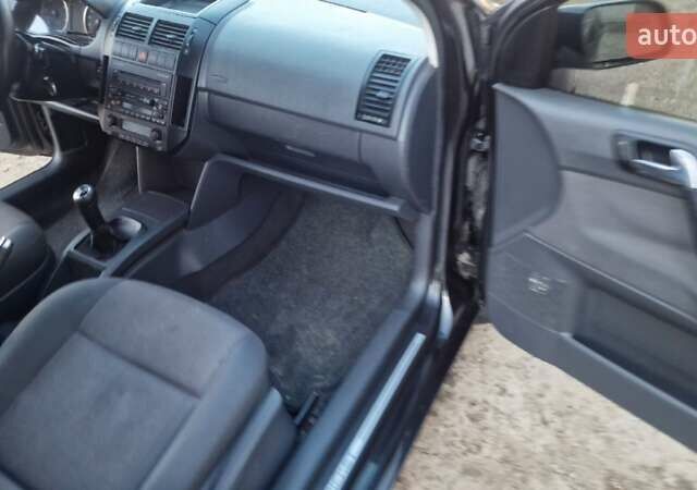 Черный Фольксваген Поло, объемом двигателя 1.4 л и пробегом 290 тыс. км за 4000 $, фото 33 на Automoto.ua