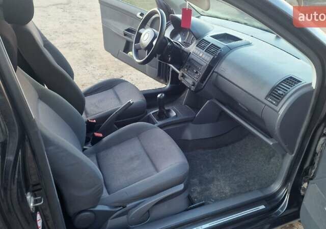 Черный Фольксваген Поло, объемом двигателя 1.4 л и пробегом 290 тыс. км за 4000 $, фото 29 на Automoto.ua