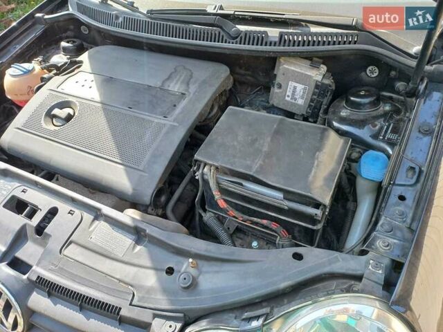 Черный Фольксваген Поло, объемом двигателя 1.4 л и пробегом 125 тыс. км за 5650 $, фото 12 на Automoto.ua