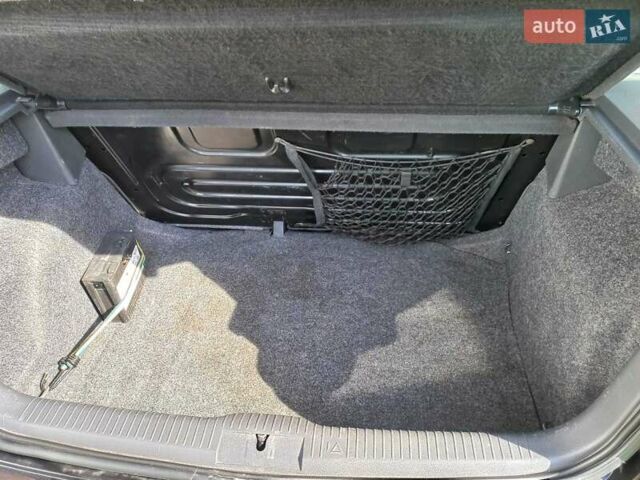 Черный Фольксваген Поло, объемом двигателя 1.4 л и пробегом 125 тыс. км за 5650 $, фото 22 на Automoto.ua