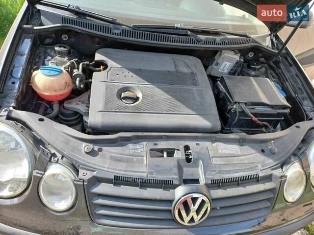 Черный Фольксваген Поло, объемом двигателя 1.4 л и пробегом 125 тыс. км за 5650 $, фото 11 на Automoto.ua