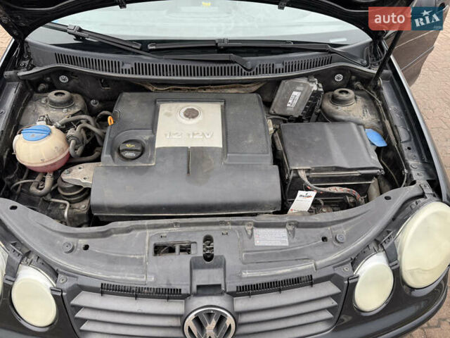 Черный Фольксваген Поло, объемом двигателя 1.2 л и пробегом 208 тыс. км за 4000 $, фото 15 на Automoto.ua