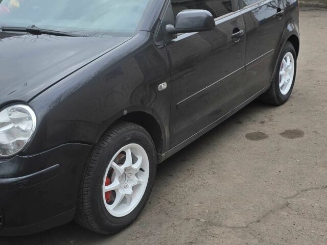 Черный Фольксваген Поло, объемом двигателя 1.2 л и пробегом 240 тыс. км за 2000 $, фото 7 на Automoto.ua