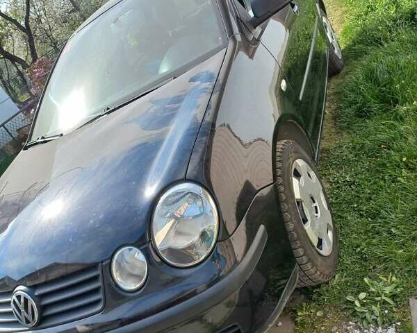 Черный Фольксваген Поло, объемом двигателя 1.4 л и пробегом 125 тыс. км за 5650 $, фото 2 на Automoto.ua