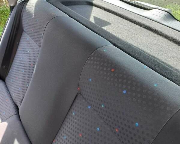 Черный Фольксваген Поло, объемом двигателя 1.4 л и пробегом 125 тыс. км за 5650 $, фото 5 на Automoto.ua