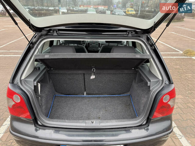 Черный Фольксваген Поло, объемом двигателя 1.2 л и пробегом 208 тыс. км за 4000 $, фото 13 на Automoto.ua