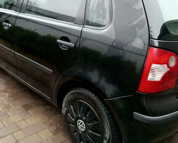Черный Фольксваген Поло, объемом двигателя 1.4 л и пробегом 245 тыс. км за 4100 $, фото 8 на Automoto.ua