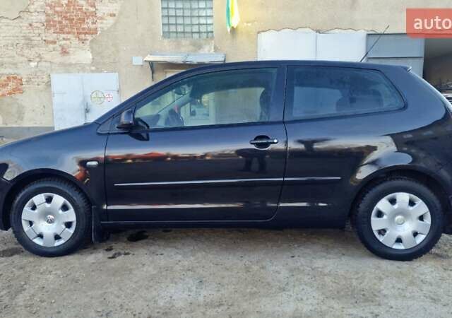 Черный Фольксваген Поло, объемом двигателя 1.4 л и пробегом 290 тыс. км за 4000 $, фото 6 на Automoto.ua