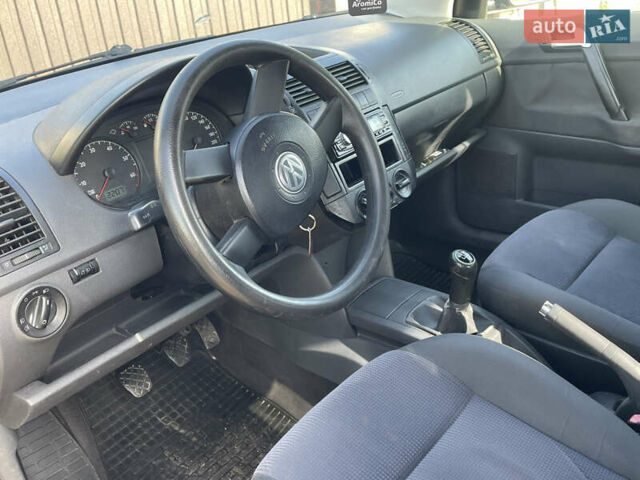 Чорний Фольксваген Поло, об'ємом двигуна 1.2 л та пробігом 242 тис. км за 2999 $, фото 6 на Automoto.ua